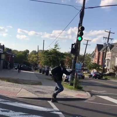 Guy on PCP rolling around in traffic