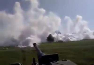 Tank deploying a smoke screen