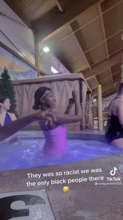 Accusing people of being racist because they don't want to be filmed while sitting in a hot tub two feet away from someone twerking