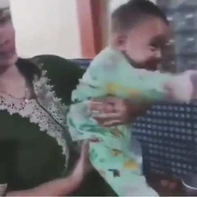 Baby boy welcoming daddy home after his been working all day