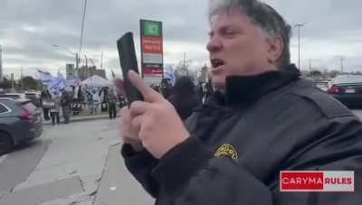 Counter protester in Toronto dressed as recently deceased Hamas leader Yahya Sinwar