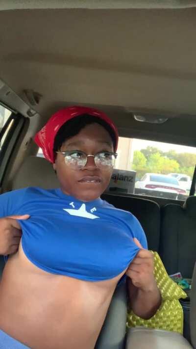 Titty drop while waiting in the car hehe (f)