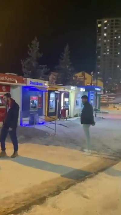 Dude waiting in an ATM lime