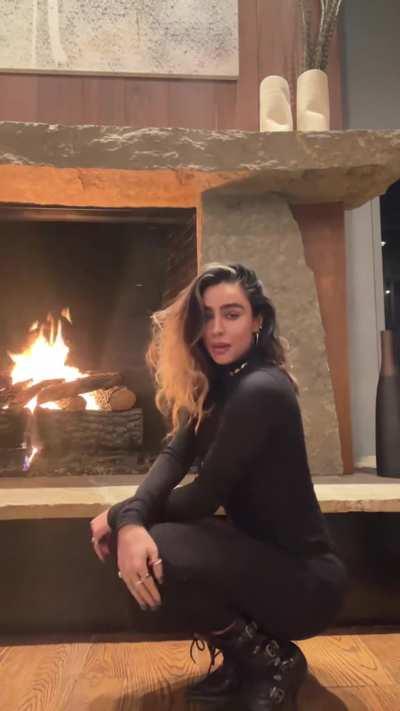 Dancing in black outfit, TikTok December 2023