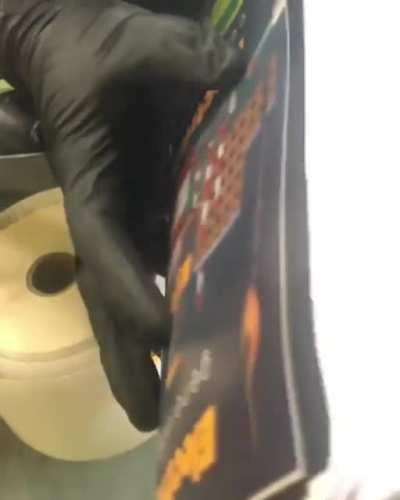 Federal agents discovered a book with counterfeit currency, but only after flipping though it in the opposite direction