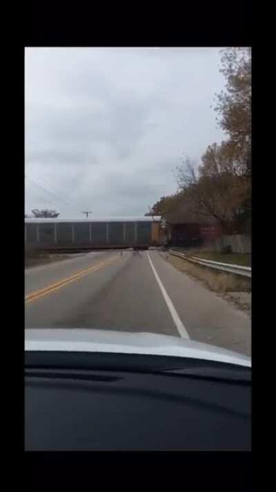 The wrong place to get stuck. The driver made it out safely.