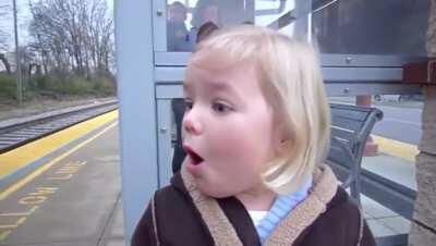 A little girl seeing a train for the first time!