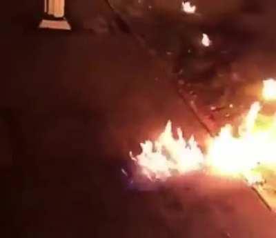 Kicking a dropped Molotov cocktail