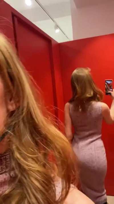 Trying on a tight dress
