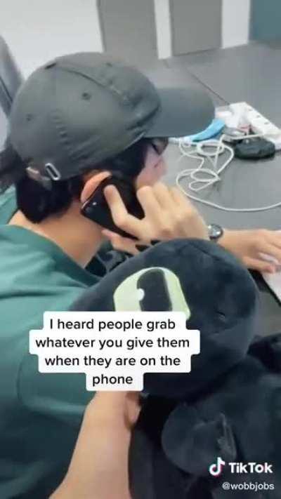 the sudden realization that you've grabbed a random item given by a co-worker while not paying attention