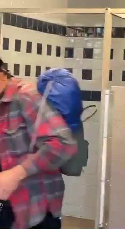 Intoxicated man verbally assaults employee attempting to clean Public Restroom.