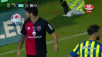Newell's Old Boys player Pablo Pérez destroys a drone that carries a banner mocking his team.