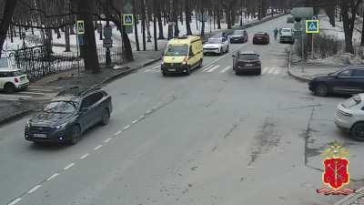 Man opens car door and sends cyclist under a car