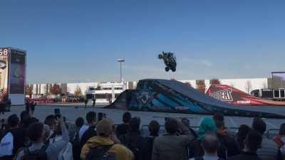 An atv doing a backflip