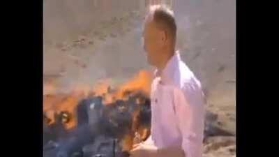 “Burning behind me is 8.5 tons of heroin, opium, hashish and other narcotics... hehehehehehe”