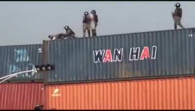 Pakistani military throwing peaceful protestor off the container while he was praying 