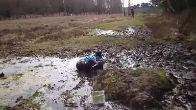 2 girls and a puddle.