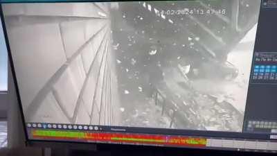 Roof of a building collapsed on woman just after she went in her car,Russia 14/2/24