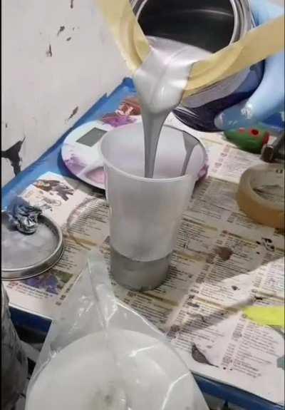 How to fill paint into another container without making a mess