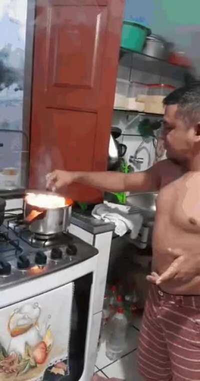 The friend tells him not to pour water in pot full of boiling oil
