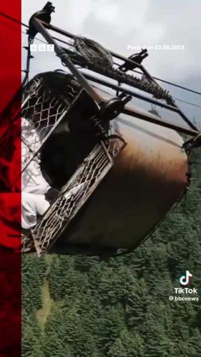 Drone footage of people stranded high up in a malfunctioned cable car in Pakistan.
