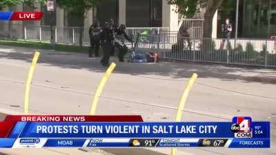 Salt Lake City cop pushes old man with cane to the ground