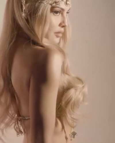 Queen Jacqueline Fernandez in a golden bikini top