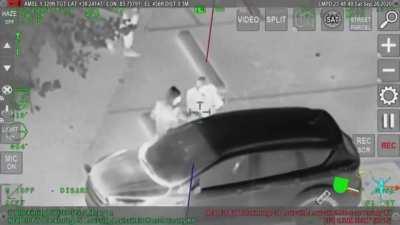 Rioters setting a random car on fire at Spalding University in Louisville, 9/27