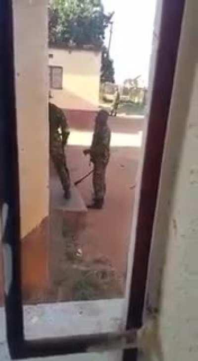 Please share. Eswatini soldiers haressing citizens in their homes