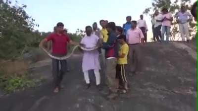 Taking a selfie with a big ass snake