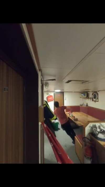 The inside of a fishing boat during a storm