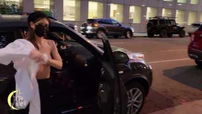 Husband didn't care who saw my tits when he had me change into my new top right there on the street. [GIF]