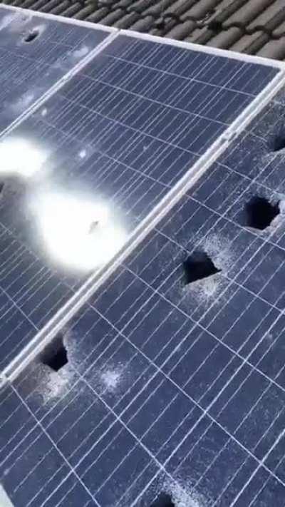 Solar panels after a heavy hail storm