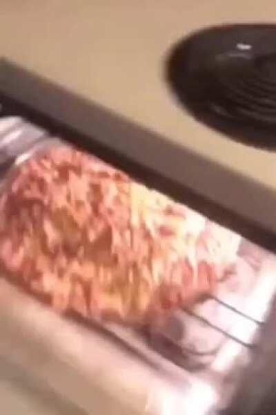 Why were you filming yourself getting a pizza from the oven?