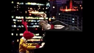 A puppet playing the piano