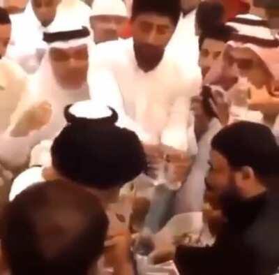 Islamic mullah spitting in peoples drinking water and kissing a child on the lips