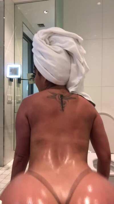 Oiled twerk in a towel