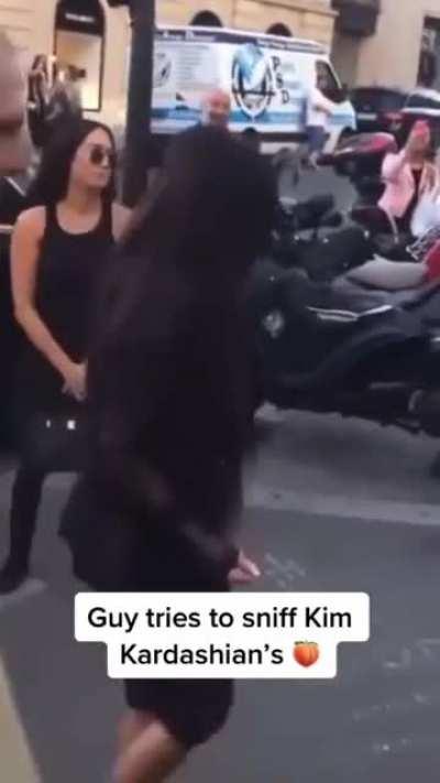 Dude tries to sniff Kim K’s ass… some insane people out there