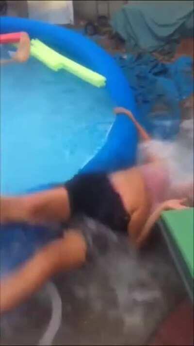 WCGW jumping into an inflatable pool