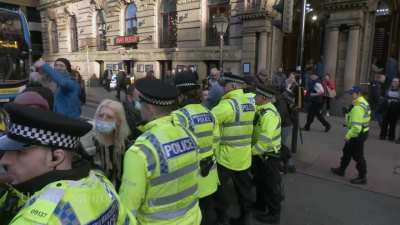 Disorder erupts at the UKIP rally in Manchester as counter-protesters clash with police, resulting in a woman being struck in the face by an officer.