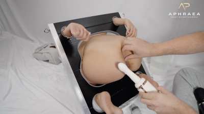 Restrained with ass full with water