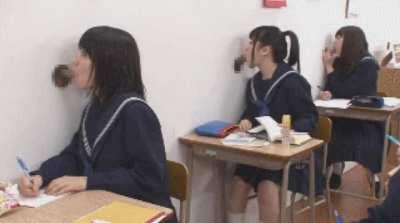 Japanese girls study hard in school