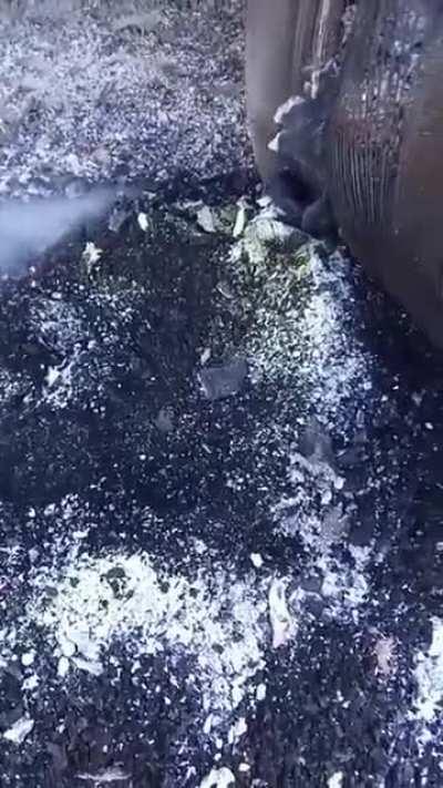 UA pov: Ukrainian soldier uses smoldering RF BTR to heat his can of food