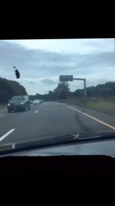 Man records himself driving on the wrong side of the freeway while running from police.