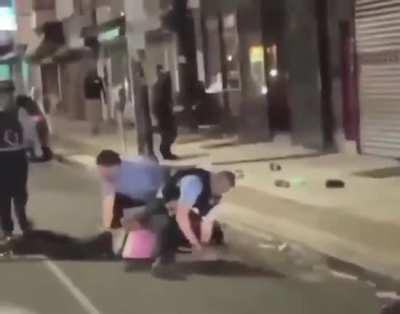 The cop literally put that man's hand on the stick just so he could have a reason to beat him up