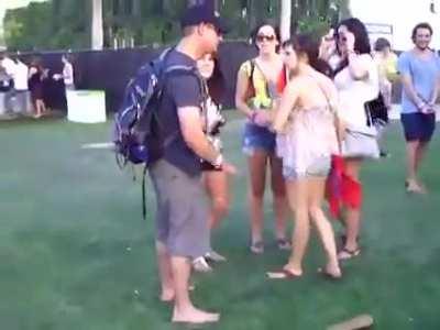 This guy is so high, he's having technical difficulties while trying to put on his right flip flop