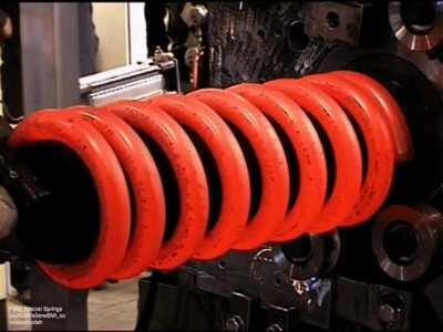 Hot coiling a huge spring