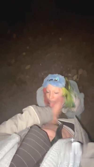 Blowing huge cock in a park