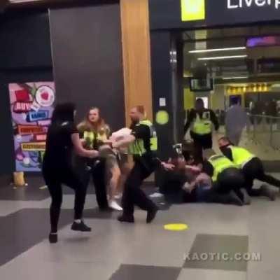 Obnoxious woman gets shoved by a police officer
