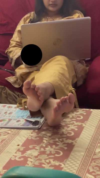 Friend's soles facing you while working